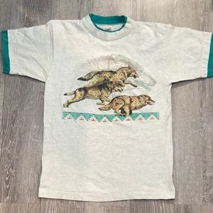 Early 90s wolves running over Aztec print.